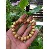 Vòng tay nữ lớn gỗ dâu tăm 8ly 10ly charm mix hoa sen giá 19.000 VND giảm 9