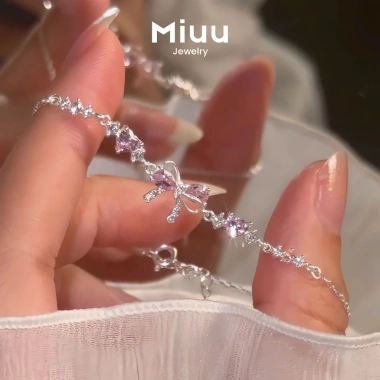 Vòng tay nữ Miuu Jewelry - Lắc tay nơ đá hồng FSC 13, giảm còn 280.000đ