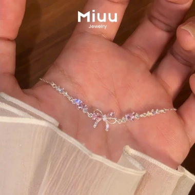Vòng tay nữ Miuu Jewelry - Lắc tay nơ đá hồng FSC 13, giảm còn 280.000đ