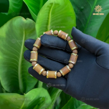 Vòng tay trầm hương trụ trúc bọc vàng Sơn Mộc Hương - Phong thủy may mắn, giảm 329k 9 Vòng tay trầm hương trụ trúc bọc vàng Sơn Mộc Hương - Phong thủy may mắn, giảm 329k 9