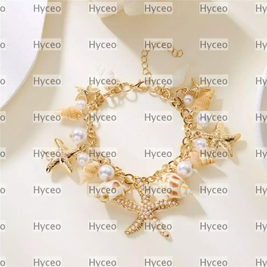 Vòng tay vỏ ốc xà cừ, vòng sao biển, mặt dây chuyền ngọc trai tua rua - 49.500₫