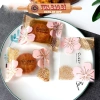 100 túi Đựng Bánh Kẹo Tết 2.026 - Bao Bì Trà Sakura Hàn Nhiệt, Giá Chỉ 22.000đ