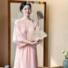 Áo Dài Tết 2.026 Cách Tân Trà Uyên Form Suông Tay Lỡ Tơ Crep In Hoa Chìm Đính Nơ - Giá chỉ 389.000₫ 2