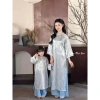 Áo Dài Trúc Thọ Mẹ & Bé Gái Cách Tân Suông Gấm Cao Cấp Tặng Bờm Xốp 318.800₫ 8