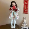Áo khoác kiểu váy bé gái viền đỏ phù hợp tết và ngày thường có trầm bông giá 340.000₫ 3