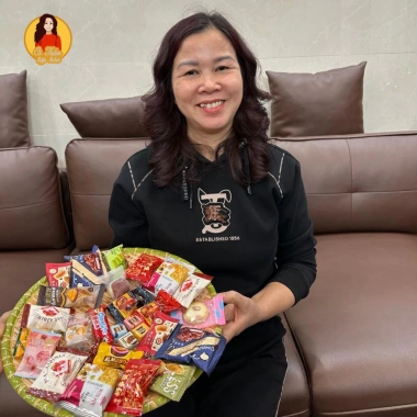 Bánh kẹo Tết mix hơn 20 loại socola, sữa, trà xanh, cam đào Túi quà sum vầy 120.000 VND 2