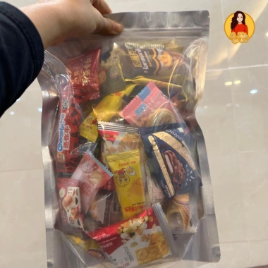 Bánh kẹo Tết mix hơn 20 loại socola, sữa, trà xanh, cam đào Túi quà sum vầy 120.000 VND 3