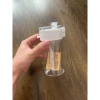 Bình nhựa Muji cao cấp trong suốt, nắp chống tràn + quai silicone – giá chỉ 30.000₫ 4