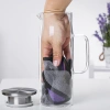 Bình thủy tinh chịu nhiệt có quai cầm, nắp inox - Đựng nước 1L Giá ưu đãi 115.000₫ 4