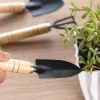 Bộ dụng cụ làm vườn mini 3 món cán gỗ cho đất trống cây - Giá 12.000 VND 5