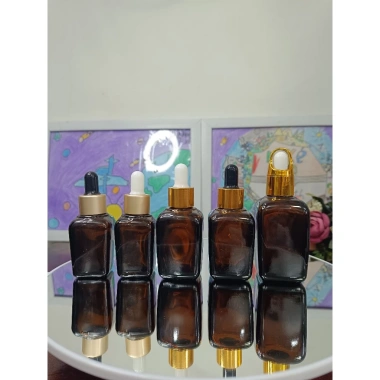 Combo 10 chai Vỏ chai vuông nâu 10ml 30ml 50ml 100ml Bột khoen vàng 65.000đ