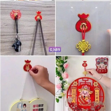 Combo 10 móc treo đồ họa tiết túi tiền chữ Phúc - Móc dán cường lực bám dính, chịu lực tốt, mẫu mới - Giá chỉ 28.999₫ 5