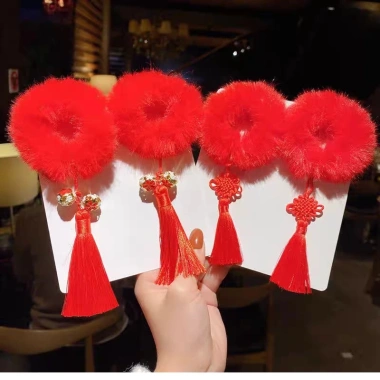 Cột tóc bông xù tròn đỏ gắn chuông, thỏ, tua rua, nơ - Set 2 chiếc PK251 giảm giá 38.5k cho Tết Năm Mới