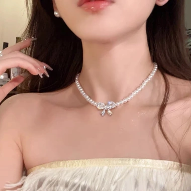 Dây chuyền vòng cổ chuỗi ngọc mix nơ tiểu thư - Phong cách tiệc tùng, chụp áo dài Tết cho nữ, 41.000₫