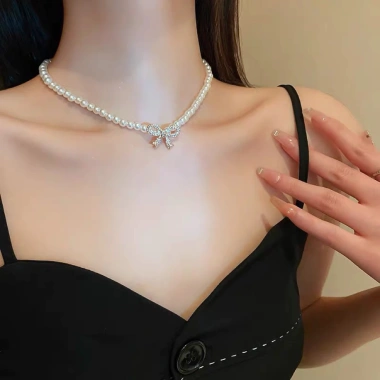 Dây chuyền vòng cổ chuỗi ngọc mix nơ tiểu thư - Phong cách tiệc tùng, chụp áo dài Tết cho nữ, 41.000₫ 4 Dây chuyền vòng cổ chuỗi ngọc mix nơ tiểu thư - Phong cách tiệc tùng, chụp áo dài Tết cho nữ, 41.000₫ 4
