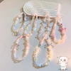 Dây đeo điện thoại Sweet Fairy chống mất, ốp lưng đính hạt mặt dây chuyền - Giá chỉ 17.400₫