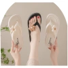 Dép tông đi biển nữ xỏ ngón đính hoa cúc, đế cao 3cm chống trơn trượt, chỉ 82.999₫ 2