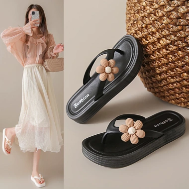 Dép tông đi biển nữ xỏ ngón đính hoa cúc, đế cao 3cm chống trơn trượt, chỉ 82.999₫