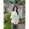 Đồ bộ đi chùa cách tân cổ tết đính nơ lụa gấm Pháp dáng xòe voan 2 tầng tiểu thư gấm mềm - 325.000₫ 2