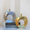 Đồ decor tủ kệ hình quả táo sứ cao cấp màu vàng bạc - Giá ưu đãi 139k