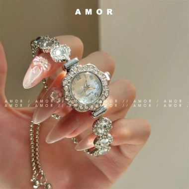 Đồng hồ nữ cổ điển dây rút hoa full zircon - Phụ kiện thời trang giá 104.666 VND
