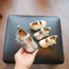 Giày búp bê bé gái quai ngọc đính nơ ren - Dễ thương cho tiệc và chụp ảnh Lễ Tết 2.026, giảm còn 209.000₫ 2