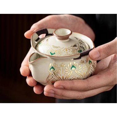 Mini bộ ấm chén trà men sứ cao cấp hoa văn, kèm túi đựng tiện lợi 2