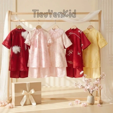 Quần áo trẻ em Tiểu Yến KID AD Tết tơ vàng 4 tà thêu hạc, vải đỏ thêu hoa, lông, giảm còn 349.000đ