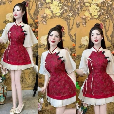 Sét váy Tết áo kem viền đỏ đính nơ tay loe chân váy ngắn tùng xòe 178.030 VND