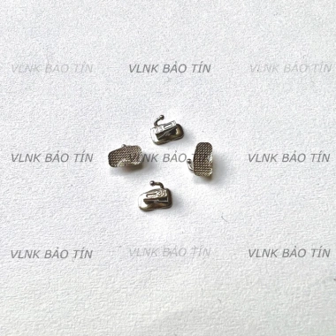 Túi 4 mắc cài răng 6,7 thép không gỉ bám dính chắc Niềng răng chỉnh nha 25.000₫
