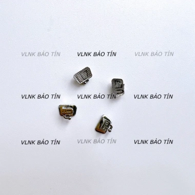 Túi 4 mắc cài răng 6,7 thép không gỉ bám dính chắc Niềng răng chỉnh nha 25.000₫