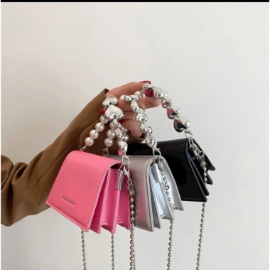 Túi đeo chéo mini da vân xích bạc Hàn Quốc – Dây tim ngọc cute, giá 89.000₫ 8 Túi đeo chéo mini da vân xích bạc Hàn Quốc – Dây tim ngọc cute, giá 89.000₫ 8