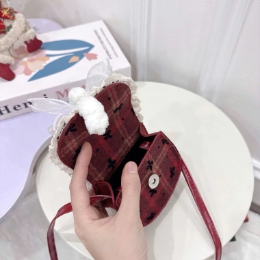Túi đeo chéo mini dáng bầu dạ đỏ phối nơ cute, siêu xinh, giá chỉ 65.000 VND giảm từ 83.850 VND