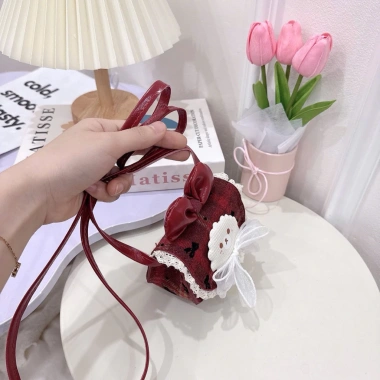 Túi đeo chéo mini dáng bầu dạ đỏ phối nơ cute, siêu xinh, giá chỉ 65.000 VND giảm từ 83.850 VND