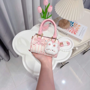 Túi vải mini bé gái thời trang quai xách cầm tay, đeo chéo, kèm móc gấu xinh - TXN464, giá chỉ 75.000₫