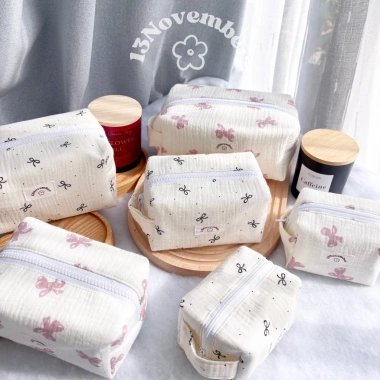 Túi vải nơ hồng đen đựng đồ trang điểm - Tiện dụng, xinh xắn, chỉ 89.000₫