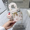 Túi xách mini Hello Kitty dáng cốp đủ màu, cầm tay, đeo chéo + móc gấu cute 67.500₫ 4