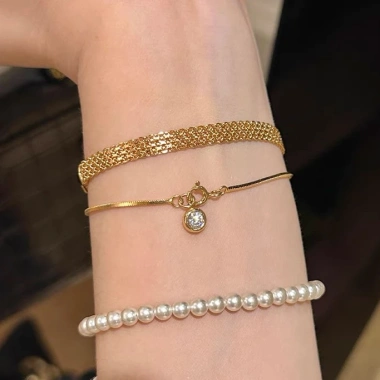 Vòng tay nữ thép titan không phai màu, dây đeo vàng bện cổ điển, giao nhanh 1 ngày, giá chỉ 51.000₫