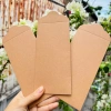 Xấp 10 bao lì xì trơn giấy kraft dây cứng tự vẽ, trang trí, viết thư pháp giá 24.500₫ 5