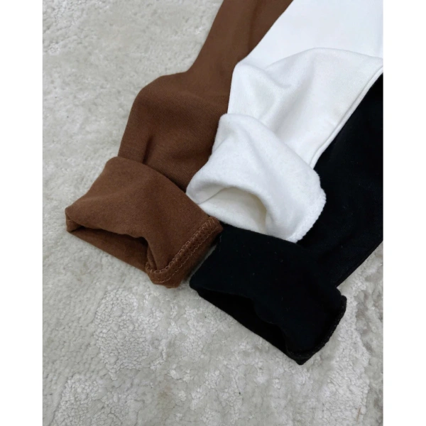 Áo giữ nhiệt cổ ba dây thêu gấu giữ ấm tốt nhưng độ bền sau vài lần giặt lại khiến người dùng bất ngờ. - Ảnh 5 Áo giữ nhiệt cổ ba dây thêu gấu giữ ấm tốt nhưng độ bền sau vài lần giặt lại khiến người dùng bất ngờ. - Ảnh 5
