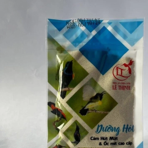 Một lựa chọn mà nhiều người nuôi chim đã thử là Combo x5 Gói Cám Hút Mật Lê Thịnh (Dưỡng Hót). (Ảnh 3)