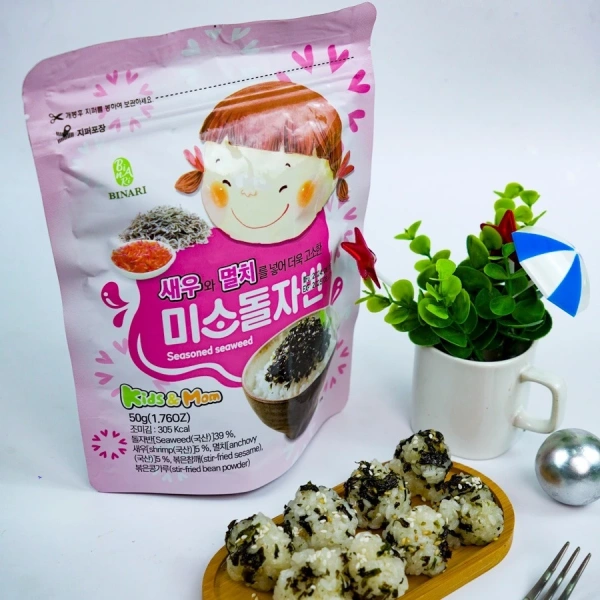 Hạt diêm mạch (puff rice) hoặc bột bánh quy mỏng có thể được rắc nhẹ lên món ăn trước khi đóng gói. (Ảnh 4) Hạt diêm mạch (puff rice) hoặc bột bánh quy mỏng có thể được rắc nhẹ lên món ăn trước khi đóng gói. (Ảnh 4)