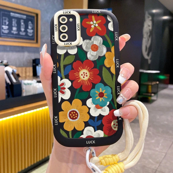 Thêm dây đeo vào ốp lưng hoa cho Samsung giúp cố định điện thoại nhưng lại làm tăng độ dày không ngờ - Ảnh 1
