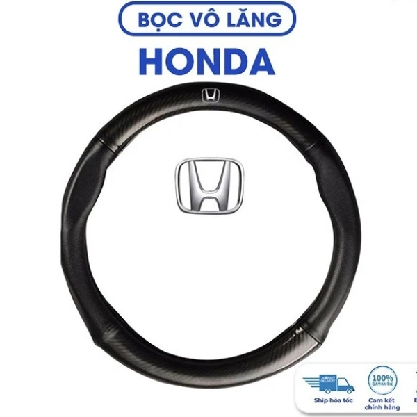 Da vân carbon mang lại cảm giác sang trọng trên vô lăng, nhưng hạt bám không như kỳ vọng. - Ảnh 1