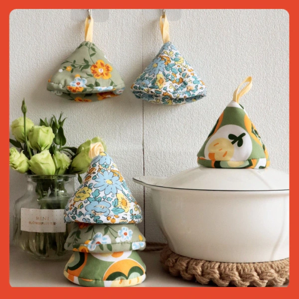 Những lúc bạn nghĩ găng tay nấu ăn đã đủ, nhưng tay cầm nồi chống bỏng mới thực sự cứu rủi. - Ảnh 1 Những lúc bạn nghĩ găng tay nấu ăn đã đủ, nhưng tay cầm nồi chống bỏng mới thực sự cứu rủi. - Ảnh 1