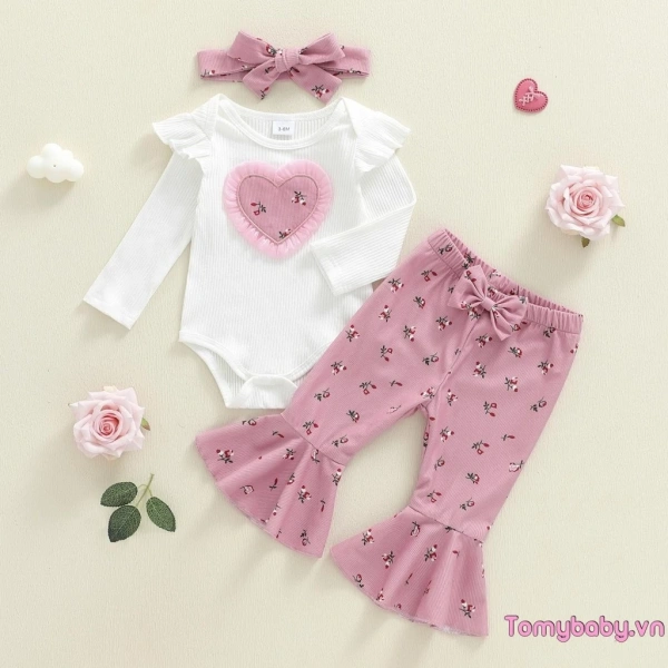 Khi áo liền quần trái tim giữ ấm cho bé gái mùa thu, băng đô nơ lại trở thành thử thách trong mỗi chuyến dạo chơi