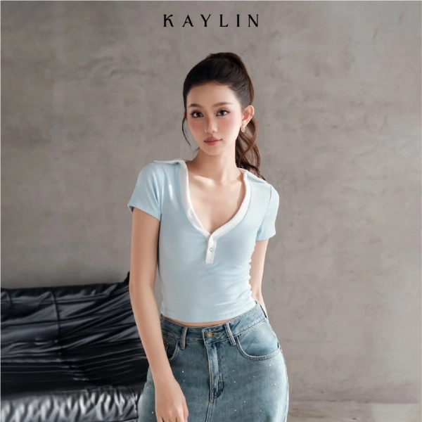 Áo polo croptop thun cotton co giãn thoải mái, nhưng độ cao cúp thường khiến việc mặc áo khoác ngoài trở nên bất tiện. - Ảnh 4 Áo polo croptop thun cotton co giãn thoải mái, nhưng độ cao cúp thường khiến việc mặc áo khoác ngoài trở nên bất tiện. - Ảnh 4