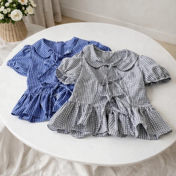 Áo sơ mi babydoll kiểu Hàn Quốc có nơ và tay phồng tạo vẻ thanh lịch, nhưng lại khiến cổ tay cảm thấy chật chẽ - Ảnh 1