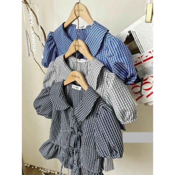 Áo sơ mi babydoll đã và đang trở thành một trong những item “điên đảo” trong tủ đồ thời trang nữ hiện đại nhờ vào thiết kế “xòe nhẹ” và những chi tiết tinh tế. (Ảnh 2)