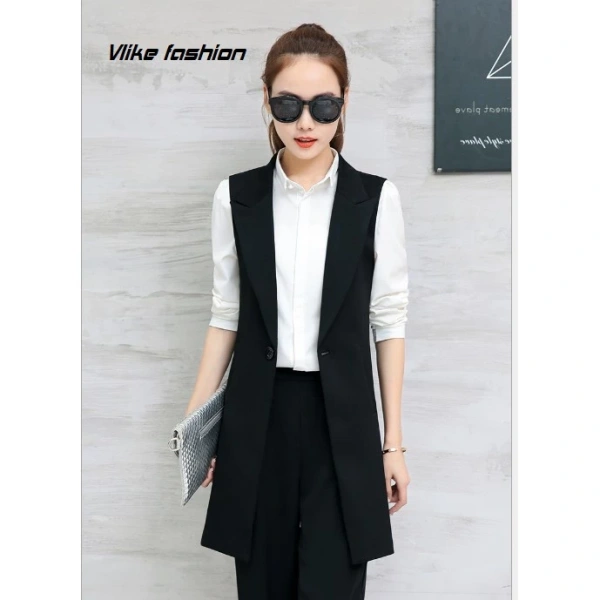 Blazer dài thường được xem là trang phục “điểm nhấn” trong môi trường công sở, thể hiện sự tự tin và chuyên nghiệp. (Ảnh 3) Blazer dài thường được xem là trang phục “điểm nhấn” trong môi trường công sở, thể hiện sự tự tin và chuyên nghiệp. (Ảnh 3)